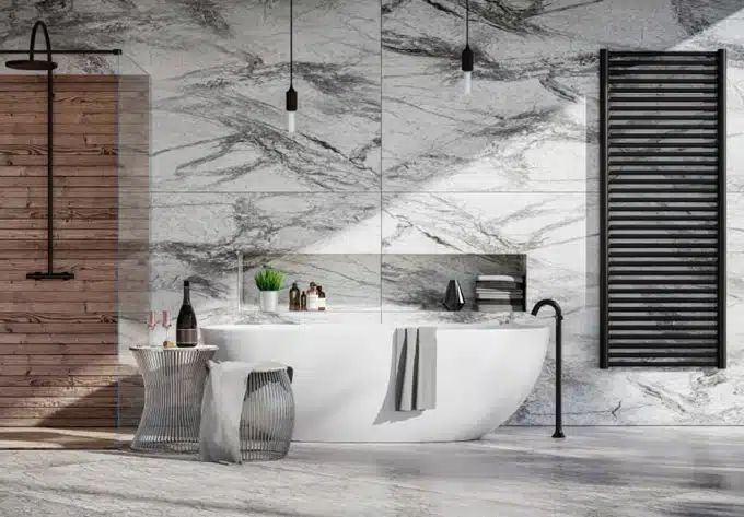 Modern wet bathroom with freestanding tub, glass shower, stone surfaces, and contemporary fixtures