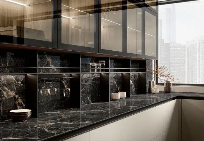 Modern kitchen with two tone cabinetry spacious island sleek countertops and decorative lighting