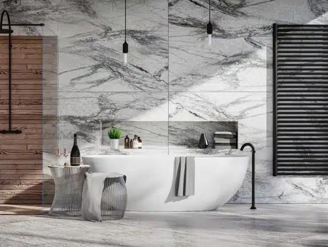 Marble wet-room bathroom with a freestanding tub and open shower